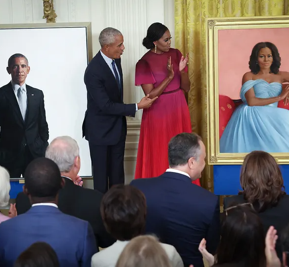 Barack and Michelle Obama return to the White House together for the first time since leaving office as their official portraits are unveiled (photos/video)