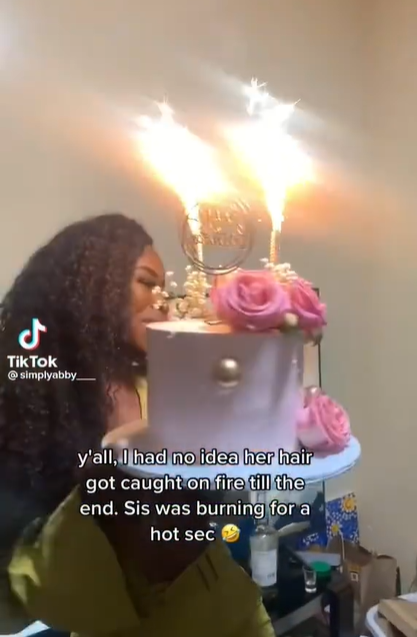 Lady?s wig catches fire while dancing with her birthday cake (video)
