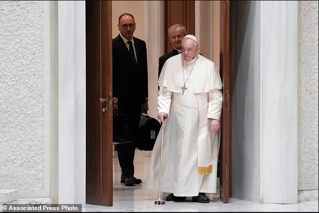 Pope Francis warns Vatican staff an 