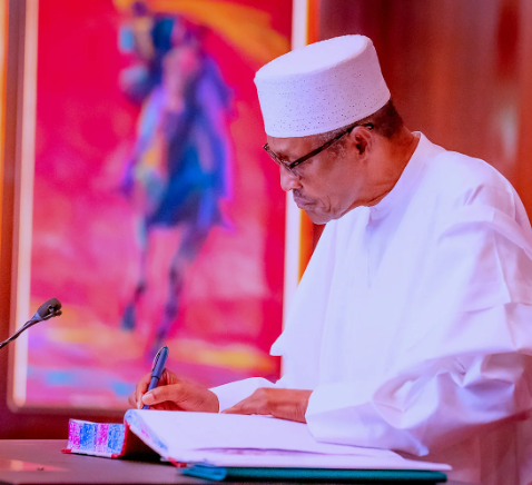 Buhari signs Defence Research bill and three other bills into law